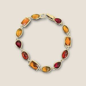 Rhinestone Link Tennis Bracelet 7.5 Inches With Red & Orange Crystal Stones